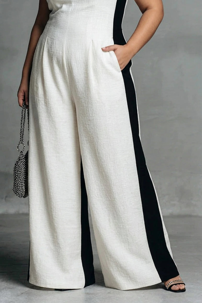 Sarah - Black & White Contrast Stripe Jumpsuit - Plus size model