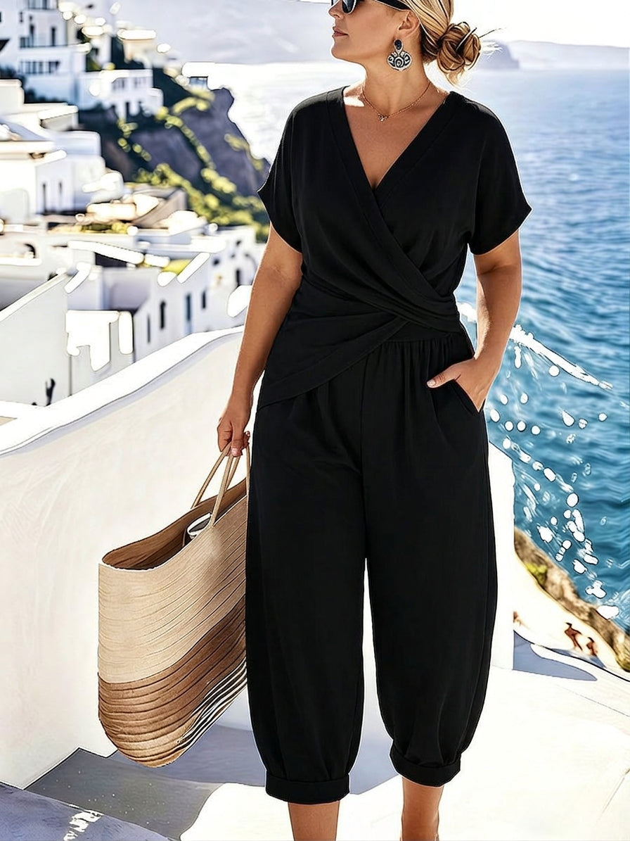 Isla | Classic Noir Wrap Jumpsuit - Plus size model