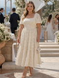 Elaria | Short Sleeve Textured Floral Detail Midi Dress - Plus size model