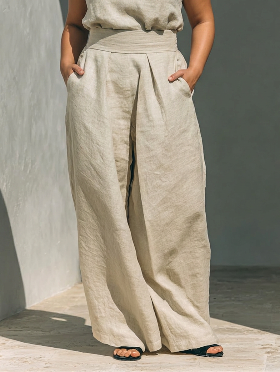 Set consisting of a sleeveless blouse and wide-leg pants made of a cotton-linen blend. - Plus size model