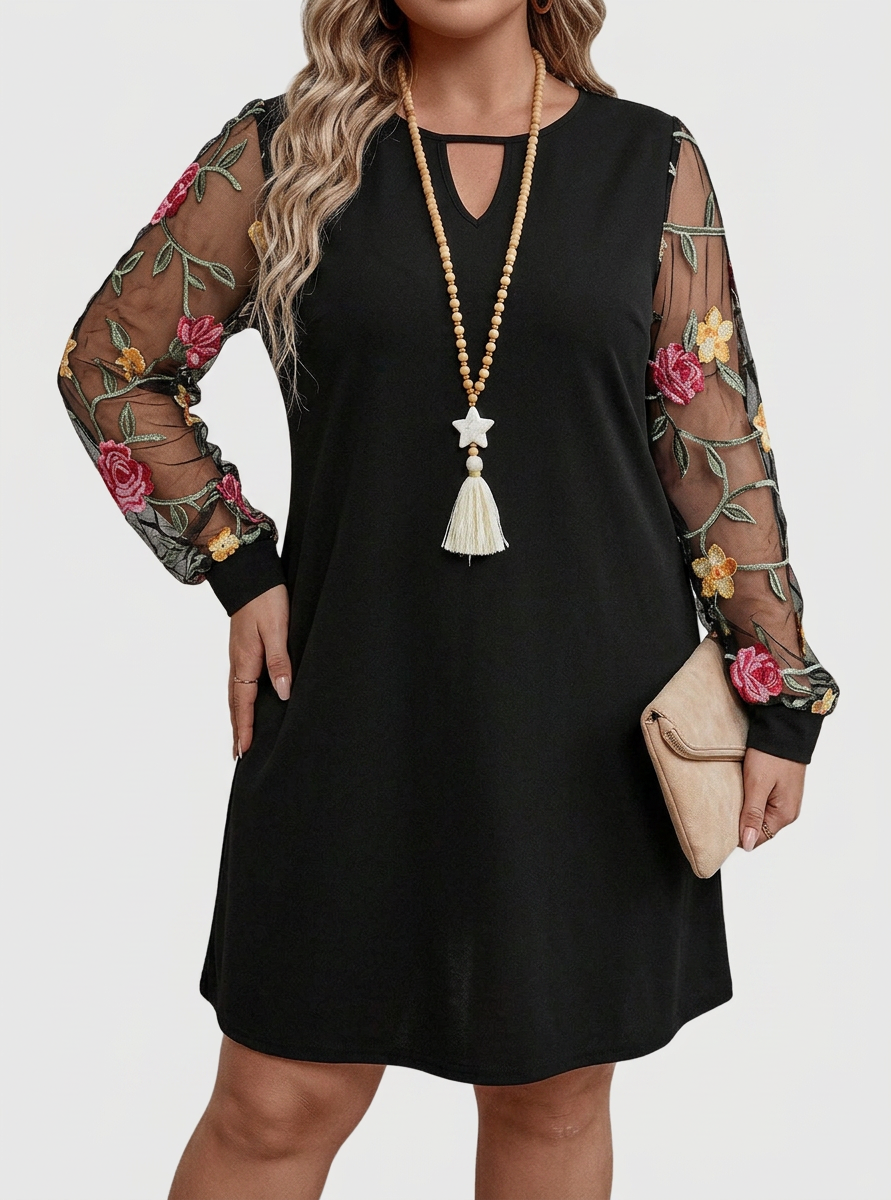 Jaia – Elegant V-Neck Floral Mini Dress - Plus size model