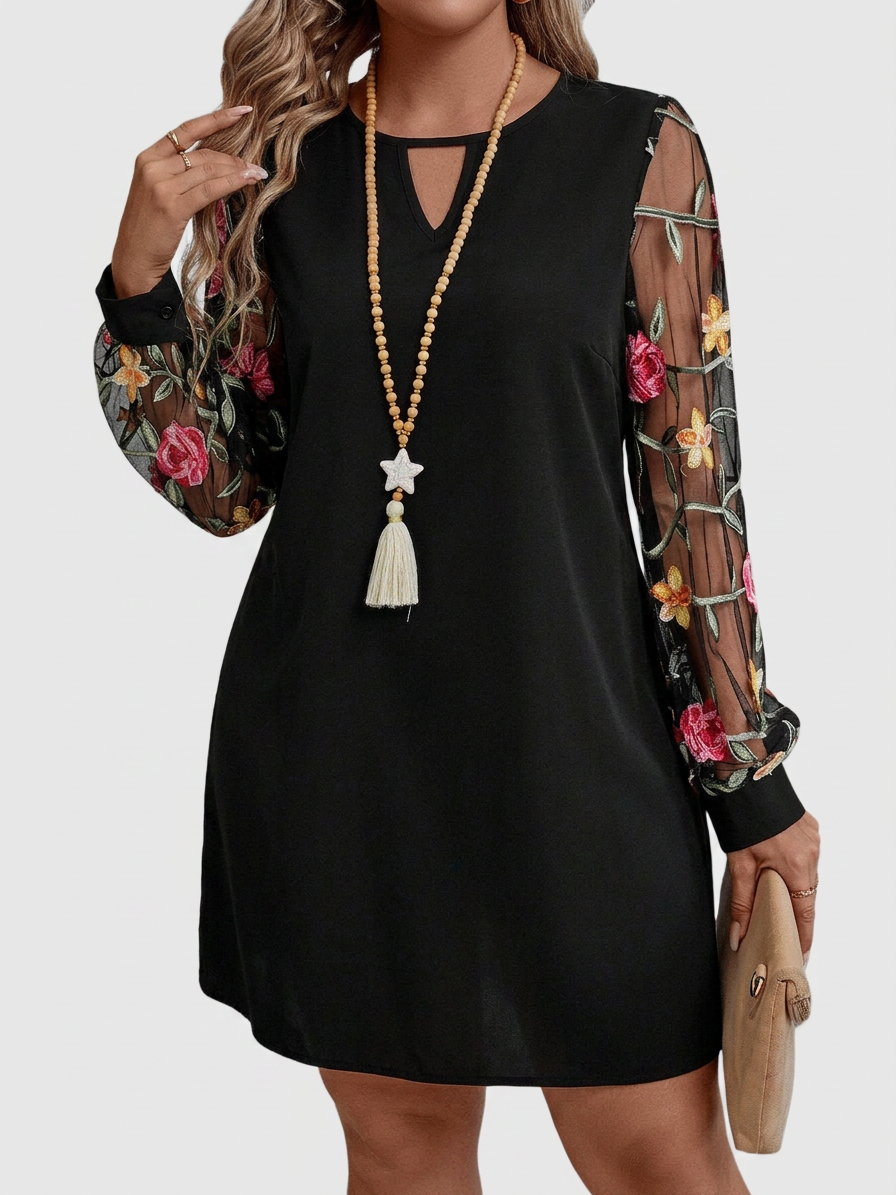 Jaia – Elegant V-Neck Floral Mini Dress - Plus size model