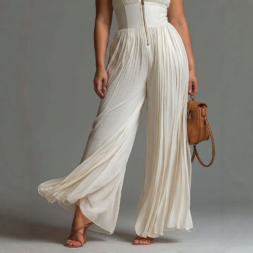 White sleeveless chiffon jumpsuit with V-neck, zip, and pleated wide-leg pants - Plus size model
