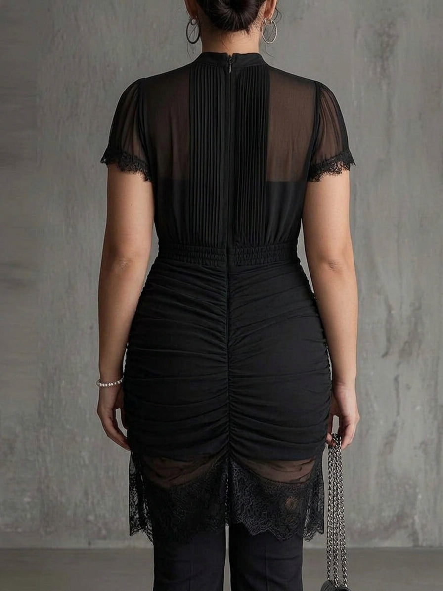 Black chiffon mini dress with pleated waist and lace trim - Plus size model