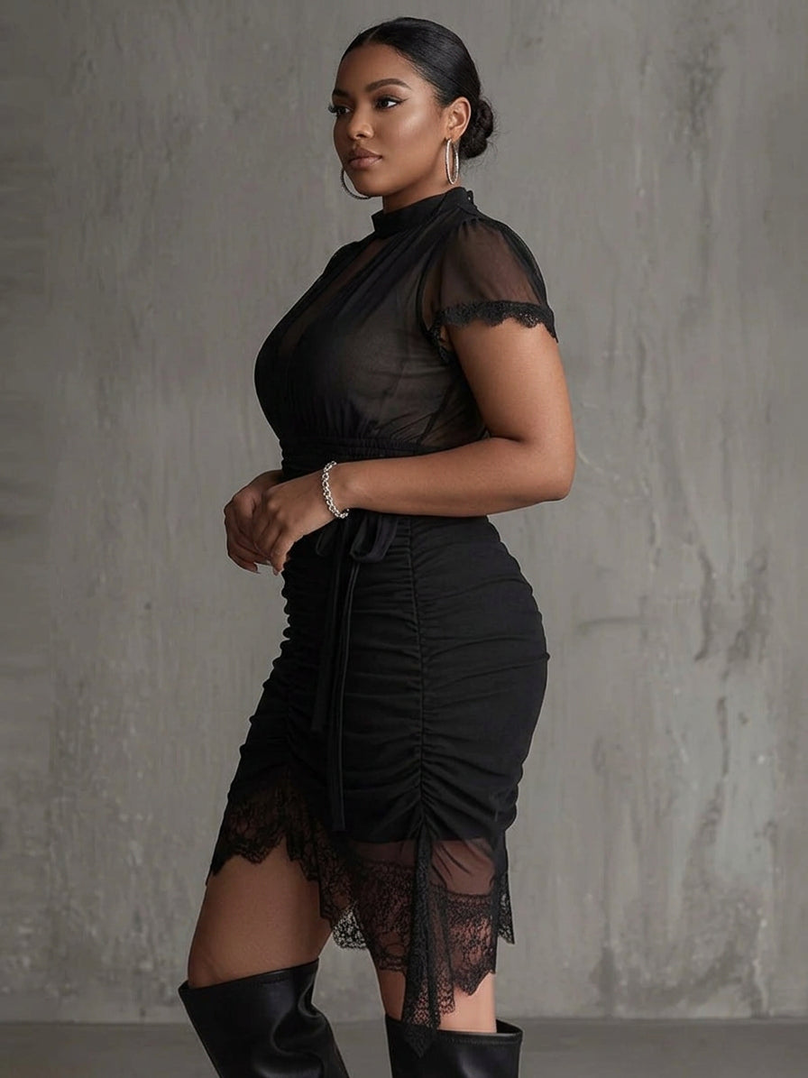 Black chiffon mini dress with pleated waist and lace trim - Plus size model